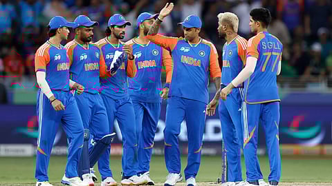 Suryakumar Yadav celebrates wicket with his teammates