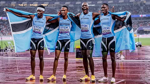 Botswana’s Lee Bhekempilo Eppie, Letsile Tebogo, Bayapo Ndori, and Busang Collen Kebinatshipi celebrate after winning the gold medal