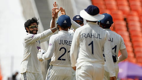 Jadeja celebrates wicket with his teammates