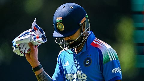 Kohli returns to the pavilion after being out