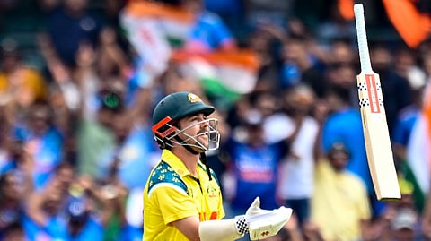 Australia's Travis Head throws his bat as he walks off the field
