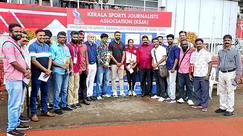 Niveth Krishna and Aditya Aji with Olympian PR Sreejesh with the award for best actors