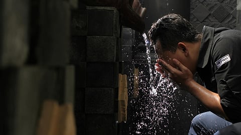 Washing face in tap water