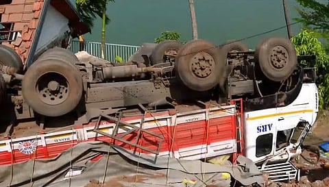 A lorry overturned and crashed onto a house in Feroke