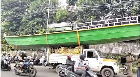 Vehicle seized for dangerous travel with a fiberglass boat tied on top