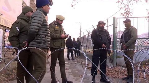 Security personnel keep vigil after an accidental explosion at Nowgam police station