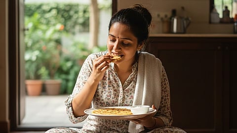 Woman eating food