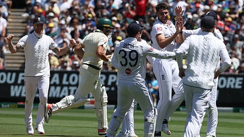 England's Josh Tongue, third right, celebrates the wicket of Australia's Scott Boland