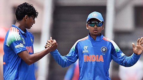 Indian team players celebrating a wicket