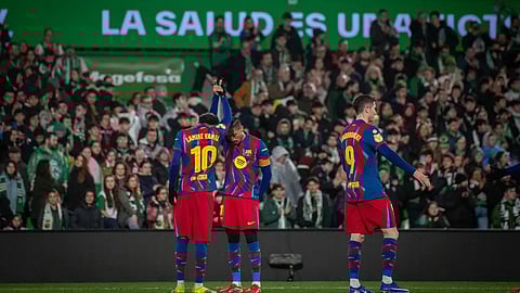 Lamine Yamal and Rafinha celebrate a goal