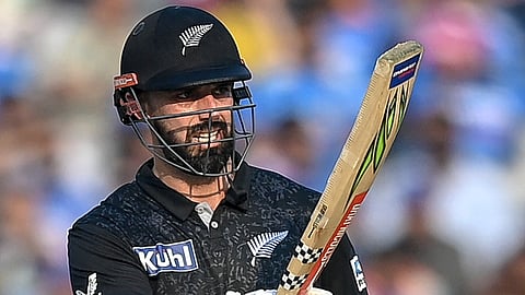 Daryl Mitchell scores a half-century