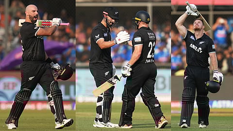 New Zealand's Glenn Phillips, right, is congratulated by batting partner Daryl Mitchell