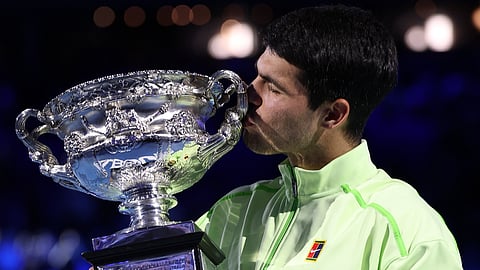 carlos alcaraz with australian open tittle