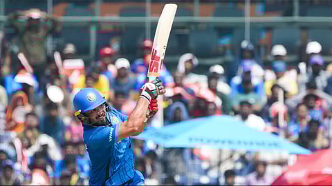 Gulbadin Naib batting