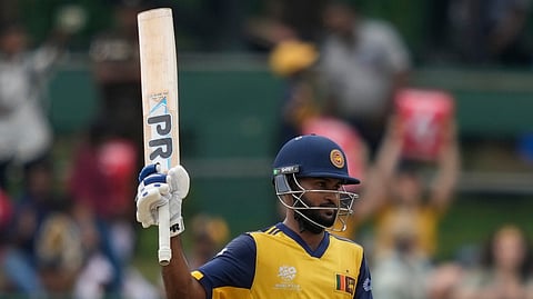 Sri Lanka's Pavan Rathnayake celebrates his fifty 