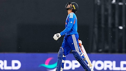 India's Abhishek Sharma reacts as he leaves the ground after losing his wicket during the T20 World Cup cricket match