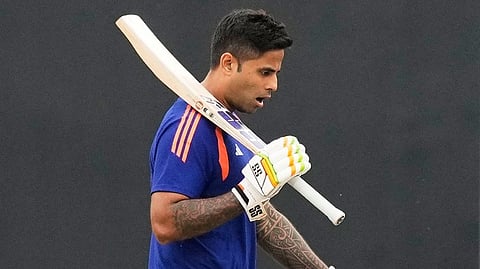 India's captain Suryakumar Yadav walks on to the field to warm up before the start of the T20 World Cup cricket match