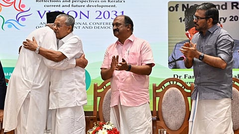 Farooq Abdullah hugs Chief Minister Pinarayi Vijayan in an emotional moment at the Vision 2031 venue