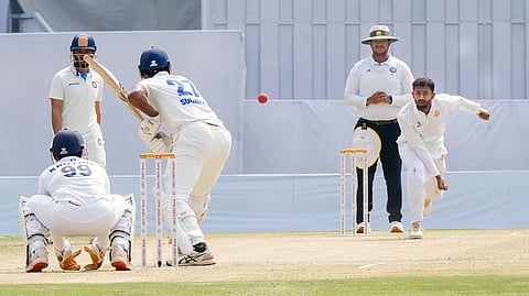 Karnataka's Shreyas Gopal bowls a delivery on day four of the Ranji Trophy first semifinal cricket match