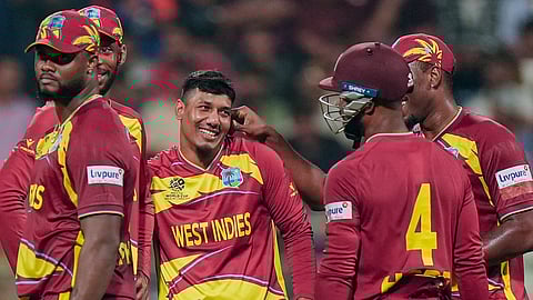 West Indies' Gudakesh Motie celebrates with teammates after taking the wicket of Zimbabwe's Dion Myers during an ICC Men's T20 World Cup 2026 cricket match
