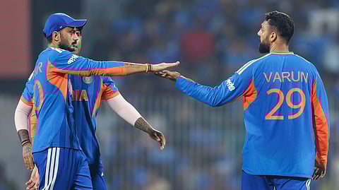 Varun Chakravarthy celebrates his wicket