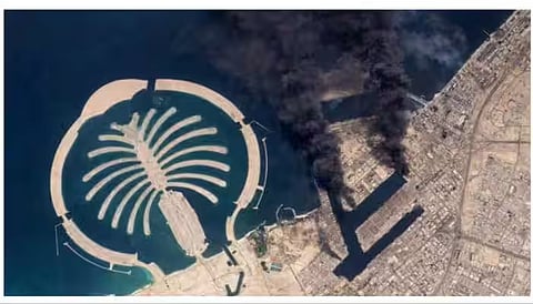 Satellite images show black smoke plumes over Dubai after Iranian missile and drone attack 
