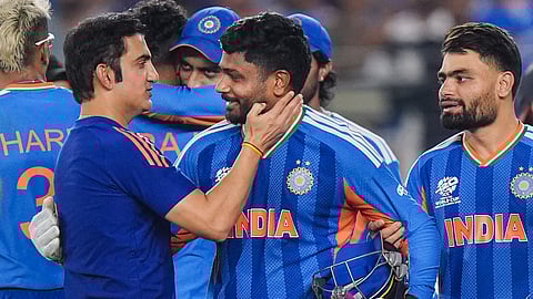  India's wicketkeeper Sanju Samson, front centre, being congratulated by head coach Gautam Gambhir