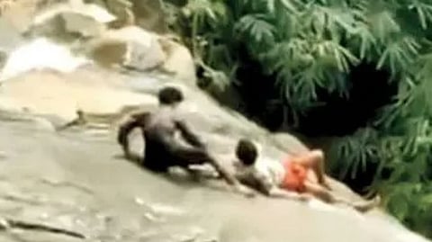 Heroic rescue of a youth at Perumbankuthu waterfall by local jeep drivers