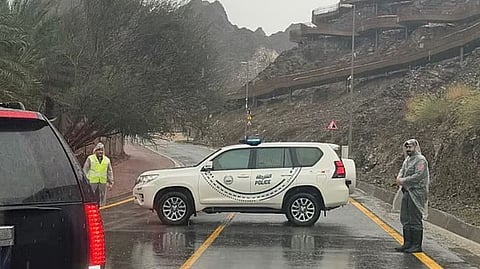 Dubai Police emergency response within 10 seconds during unstable weather providing public safety and relief in UAE