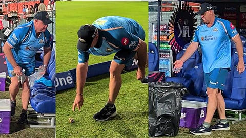 Matthew Hayden picks up trash from dugout 