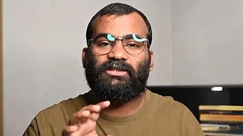 A temporary Calicut University employee suspended for violating election code