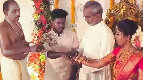 A Catholic priest takes the paternal role to perform the Kanyadan ritual for an orphan bride