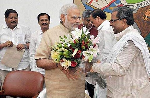 വികസന വിരുദ്ധര്‍ക്കു സഹായമില്ലെന്ന് പ്രധാനമന്ത്രി; മോദിക്കു ഭരണഘടനയെക്കുറിച്ച് ധാരണയില്ലെന്ന് സിദ്ധരാമയ്യ