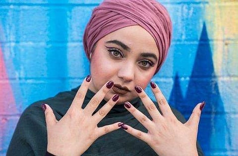 women with nail polished hands