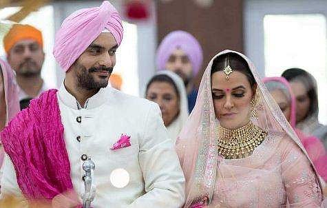 'അങ്കത് രണ്ട് വയസ് ഇളയതാണ്, നിങ്ങളുടെ ഭര്‍ത്താവല്ല, സഹോദരനാണ്'; പരിഹസിച്ചവര്‍ക്ക് മറുപടിയുമായി നേഹ ധൂപിയ