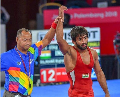 ഏഷ്യാഡിൽ ഇന്ത്യക്ക് സുവർണത്തിളക്കം; ​ഗുസ്തി പിടിച്ച് ബജ്‌രംഗ് പുനിയ ആദ്യ സ്വർണം സമ്മാനിച്ചു