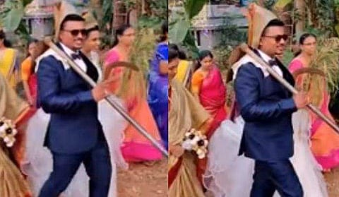 പാളത്തൊപ്പിയും തൂമ്പയും അരിവാളുമായി വധൂവരന്മാര്‍, വിമര്‍ശനം; വീഡിയോ 