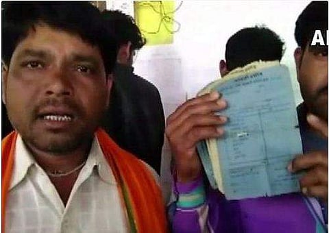 കടം 24,000 രൂപ ; എഴുതി തള്ളിയത് 13 രൂപ മാത്രം ; അന്തം വിട്ട് കര്‍ഷകര്‍