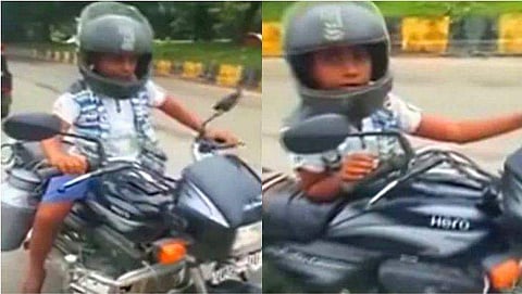 ബ്രേക്കിൽ പൊലും കാൽ എത്തില്ല, ബൈക്കിൽ പറന്ന് എട്ടുവയസ്സുകാരൻ; വിഡിയോ വൈറലായതിന് പിന്നാലെ പിഴയും 
