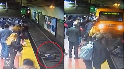 ബാലന്‍സ് തെറ്റി യുവതി വീണത് കുതിച്ചുപാഞ്ഞെത്തുന്ന ട്രെയിന് മുന്നിലേക്ക് ; ശ്വാസം നിലച്ചുപോകുന്ന വീഡിയോ