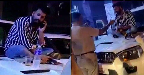 നടുറോഡില്‍ വാഹനം നിര്‍ത്തിയിട്ട് ബോണറ്റിലിരുന്ന് ബിജെപി എംഎൽഎയുടെ അനുയായികളുടെ മദ്യപാനം ; ചോദ്യം ചെയ്ത പൊലീസുകാരന് സസ്പെൻഷൻ