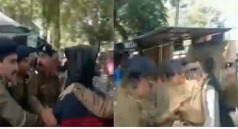 ബലാല്‍സംഗക്കേസ് പ്രതിയെ കോടതി വളപ്പില്‍ 'കൈകാര്യം' ചെയ്ത് അഭിഭാഷകന്‍, സാക്ഷിയായി പൊലീസുകാര്‍ ( വീഡിയോ)