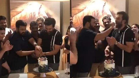 കേക്ക് മുറിച്ച് വിജയാഘോഷം; മോഹന്‍ലാലിന്റെ കാല്‍ തൊട്ടു വണങ്ങി പൃഥ്വിരാജ്; വീഡിയോ
