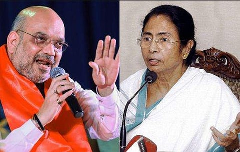 തൃണമൂലിന്റെ ആക്രമണത്തിന് ജനങ്ങള്‍ മറുപടി നല്‍കുമെന്ന് അമിത് ഷാ; പിന്നില്‍ ബിജെപിയെന്ന് തിരിച്ചടിച്ച്‌ മമത