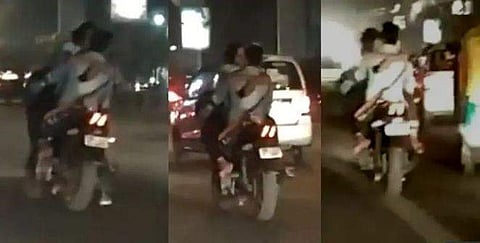 അതിവേ​ഗത്തിൽ കുതിച്ച് ബൈക്ക് ; ഇന്ധനടാങ്കിലിരുന്ന് യുവാവിനെ കെട്ടിപ്പിടിച്ച് ചുംബിച്ച് പെൺകുട്ടിയുടെ 'സ്നേഹപ്രകടനം' ; വീഡിയോ വൈറൽ