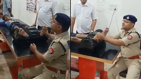 കണ്ടുപഠിയ്ക്കണം ഈ മാതൃക!; തീര്‍ഥാടകന്റെ പാദം തിരുമ്മിക്കൊടുത്ത് മുതിര്‍ന്ന പൊലീസ് ഉദ്യോഗസ്ഥന്‍ (വീഡിയോ) 