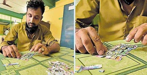 ഒറ്റനോട്ടത്തില്‍ നമ്പര്‍ കണ്ടില്ല, നിരാശയില്‍ കീറിയെറിഞ്ഞ ടിക്കറ്റില്‍ അഞ്ചുലക്ഷം രൂപ ! ; ഭാഗ്യവഴി തേടി ഓട്ടോ ഡ്രൈവര്‍ 