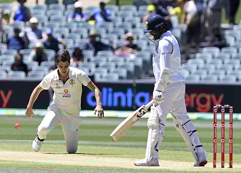 ബൂമ്രയുടെ വിക്കറ്റ് ആഘോഷിക്കുന്ന പാറ്റ് കമിന്‍സ്/ഫോട്ടോ: എപി