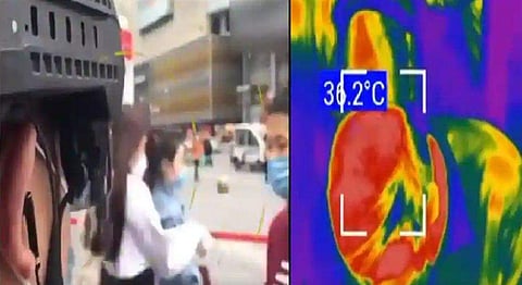 ഹെല്‍മറ്റുമായി പൊലീസ് അടുത്തുവന്നാല്‍ പനിയറിയാം; കൊറോണ രോഗികളെ കണ്ടെത്താന്‍ പുതിയ വിദ്യയുമായി ചൈന