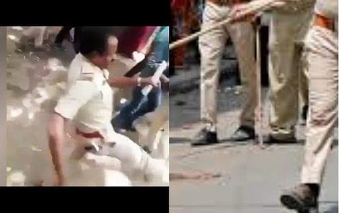 നാട്ടിലേക്ക് മടങ്ങണമെന്ന് തൊഴിലാളികൾ, തൊഴിച്ചോടിച്ച് പൊലീസ്; വിഡിയോ വൈറലായതിന് പിന്നാലെ സസ്‌പെൻഷൻ 